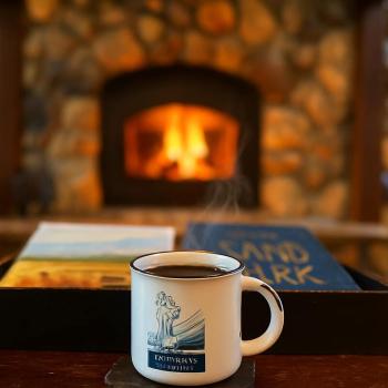 Enjoy a hot cup of coffee in front of the wood fireplace.