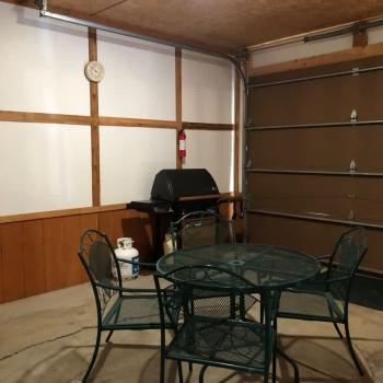 Table and grill for you to use in the garage.