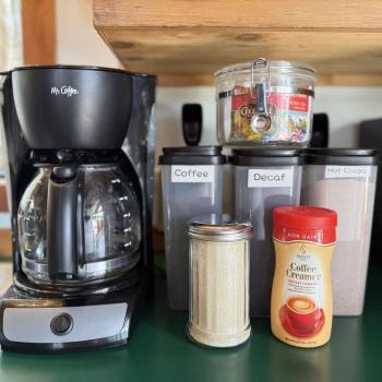 This cozy kitchen has the necessities needed for making a small meal or brewing up a cup of coffee.