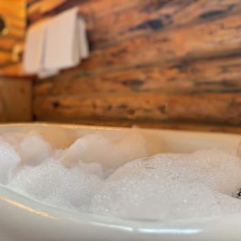 Relax in the classic claw foot bathtub.