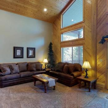 Living room is set up with lots of seating for everyone to relax during your stay.