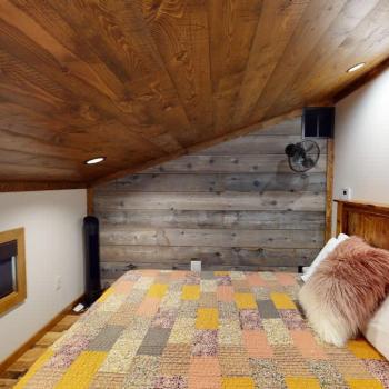 The loft bedroom as seen at the top of the stairs.