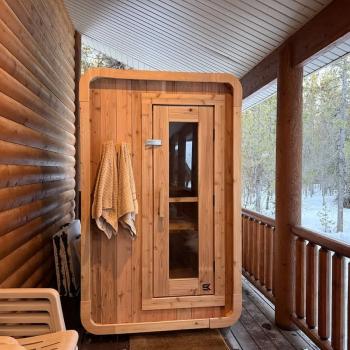 An outdoor sauna is available for your use at this cabin.