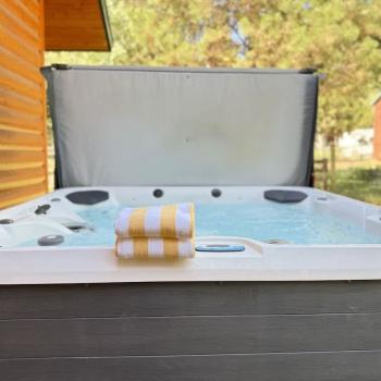 Hot tub for relaxing after a long day exploring the area.