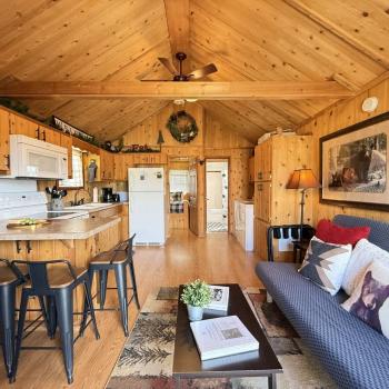 Upon entrance there is a view of the kitchen and living room area.