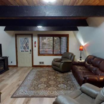 The living room is equipped with seating to relax after a long day.