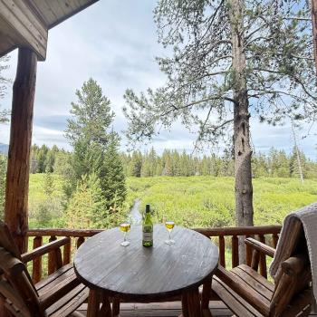 Chair on the porch overlooking the creek.
