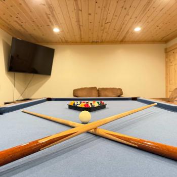 Pool table in the basement for that friendly game.