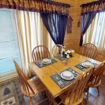 The dining table is perfect to seat up to 6 people with additional seating at the kitchen island.