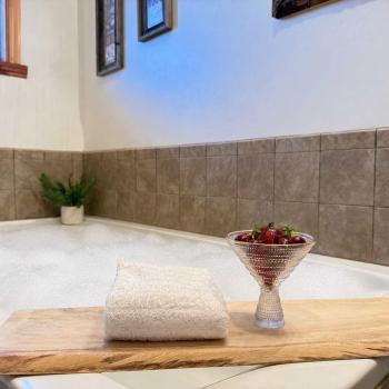 Relax in the master bath jetted tub.