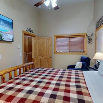 The bedroom brings in natural light to enjoy during your stay.