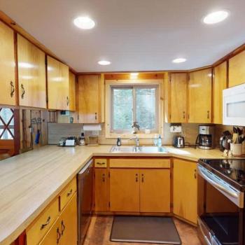 A large kitchen fully equipped for all your needs during your stay.