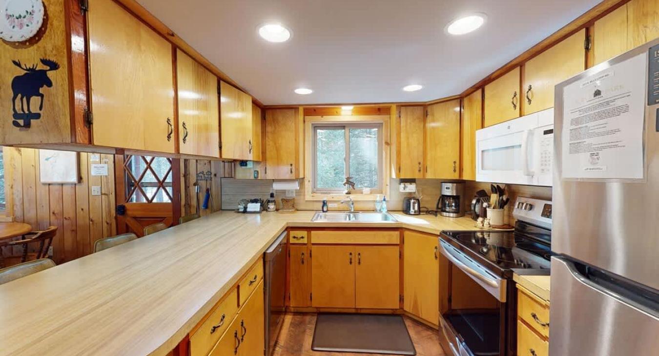 A large kitchen fully equipped for all your needs during your stay.