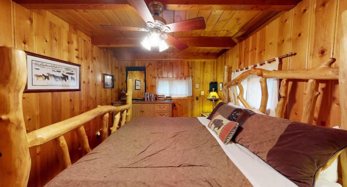 Bedroom on the main floor with a King bed.