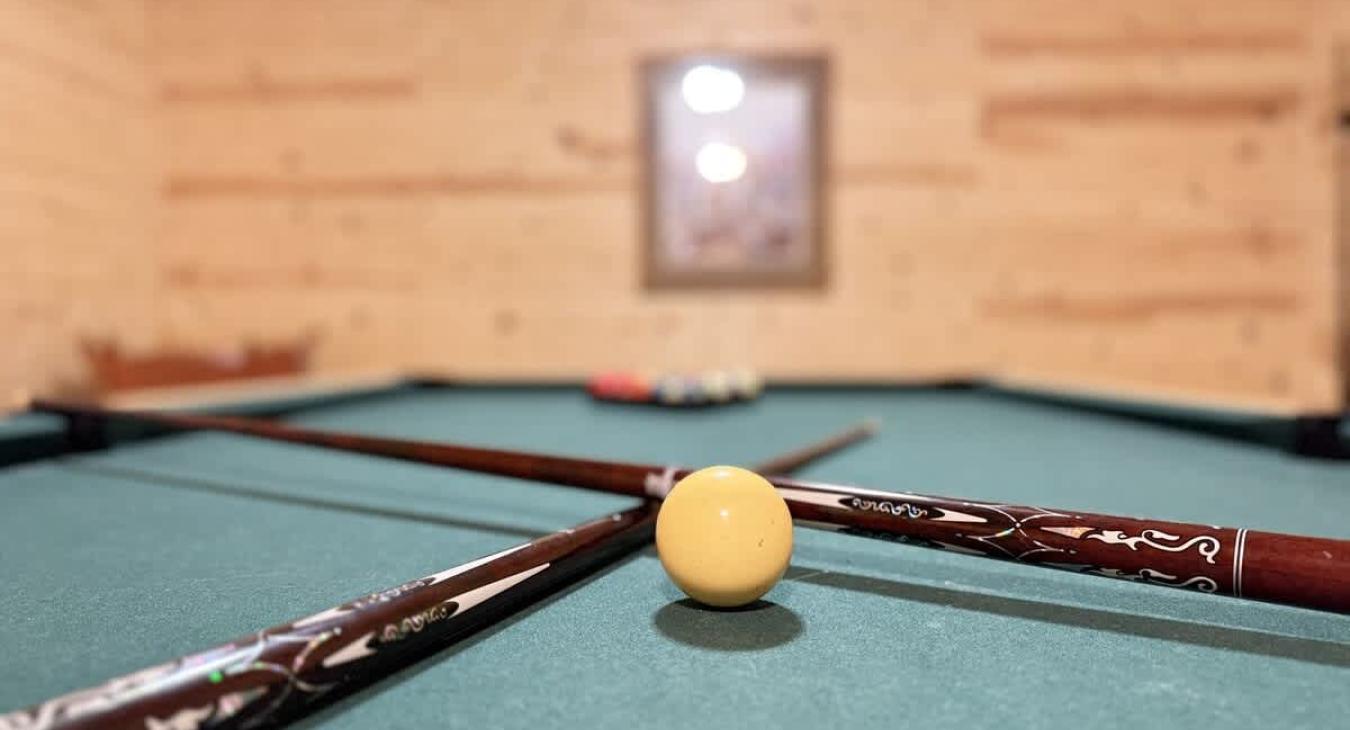 Full size pool table for those friendly pool matches.