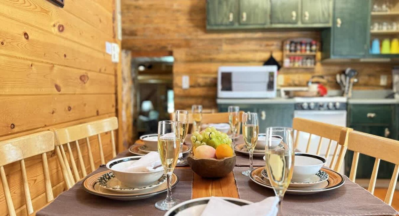 Dining room table located in the kitchen perfect for 6 people.