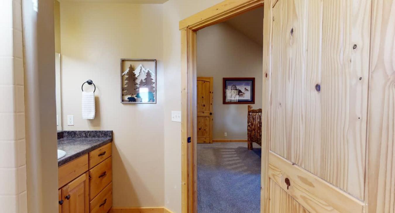 Ensuite bathroom with access to the fourth bathroom.
