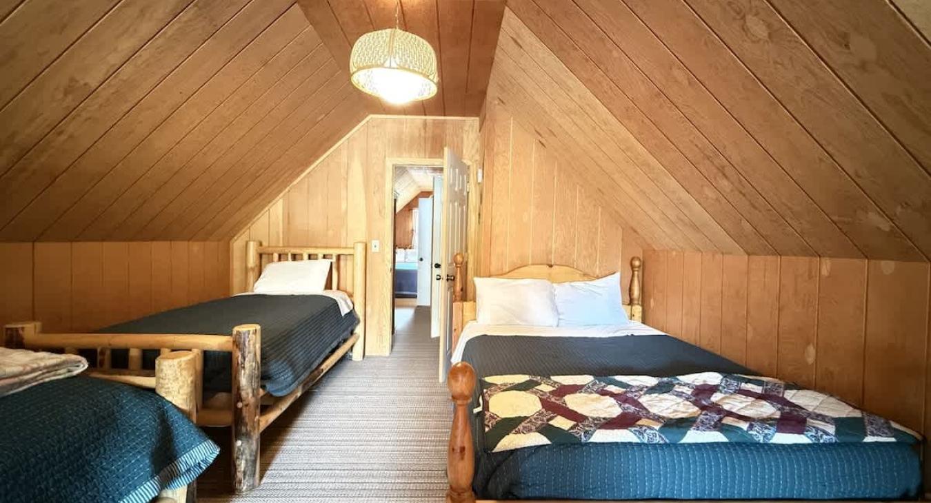 Access to the other bedroom through this door.