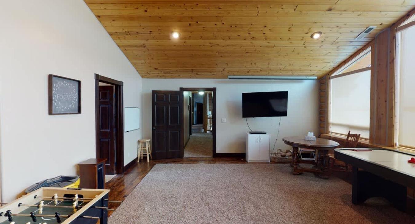 Access the rooms and shared bathroom through the hallway here.