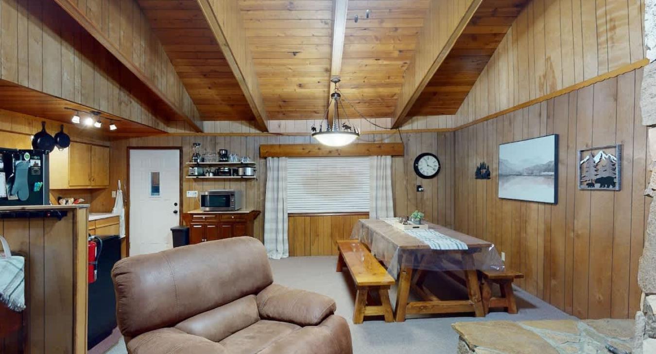 Cozy living and dining area for you to cozy up by the fire or enjoy your meal at the table.