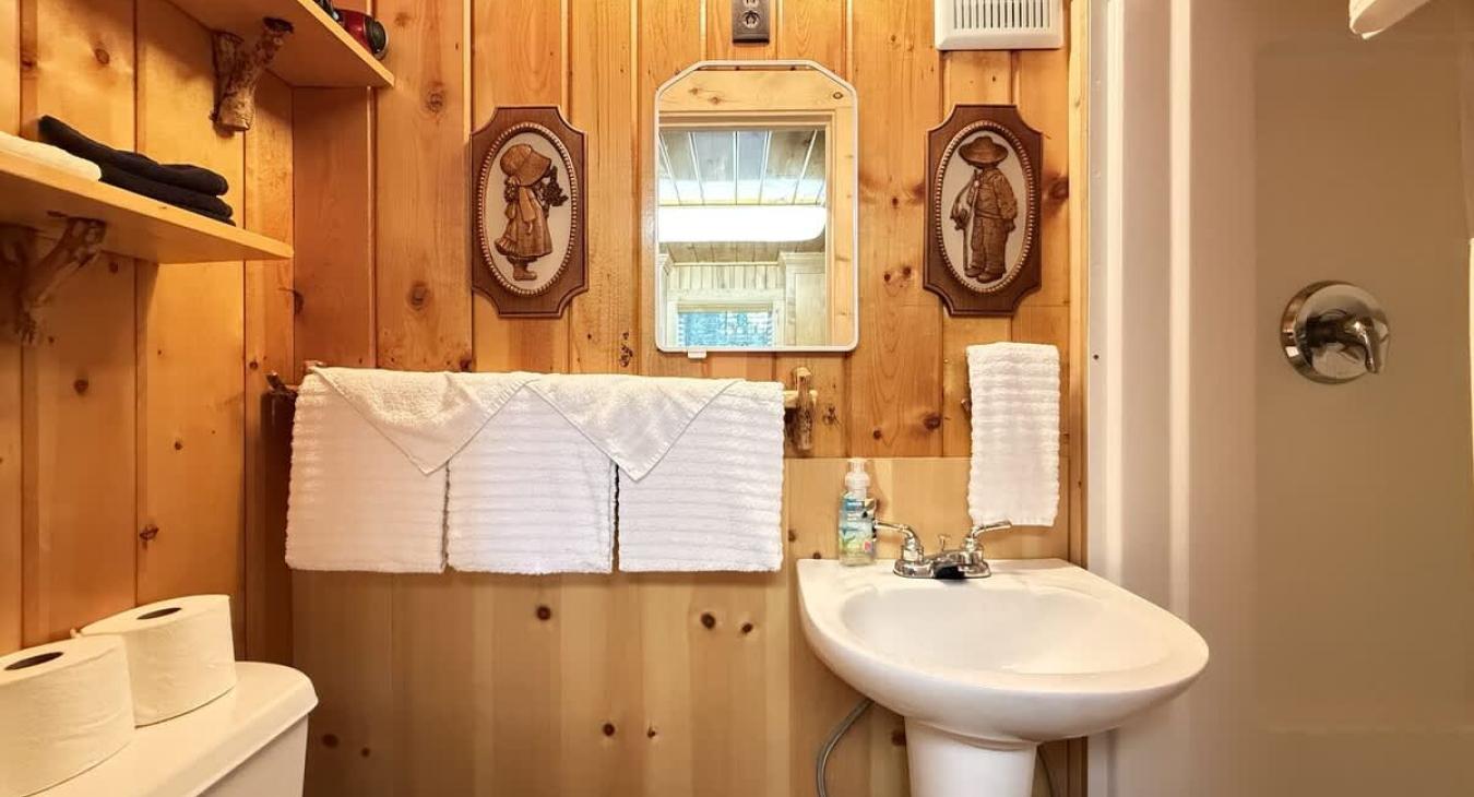 Main Level 3/4 full bathroom just off the kitchen.