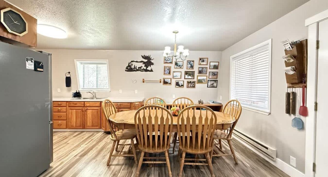 The dining room is attached to the kitchen and features a table that can sit up to 6 people at once.