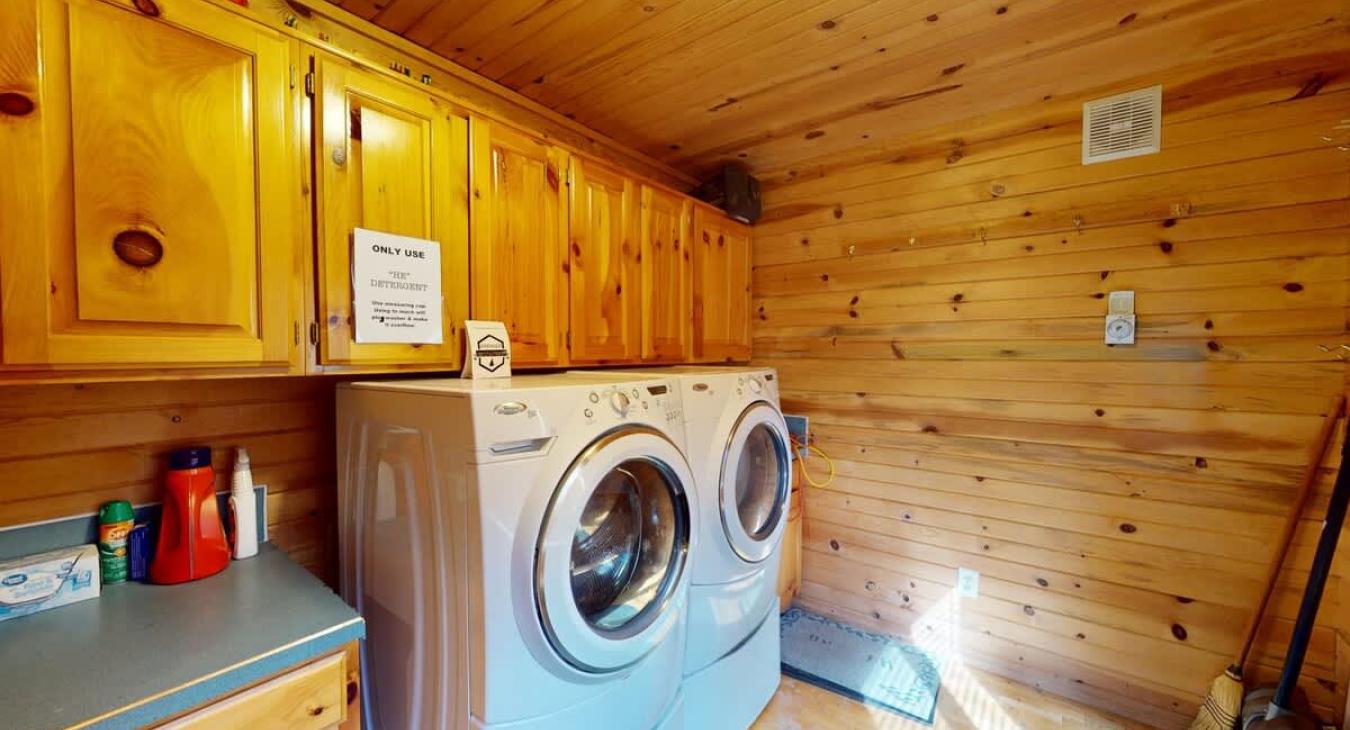 Laundry room with full size washer and dryer.