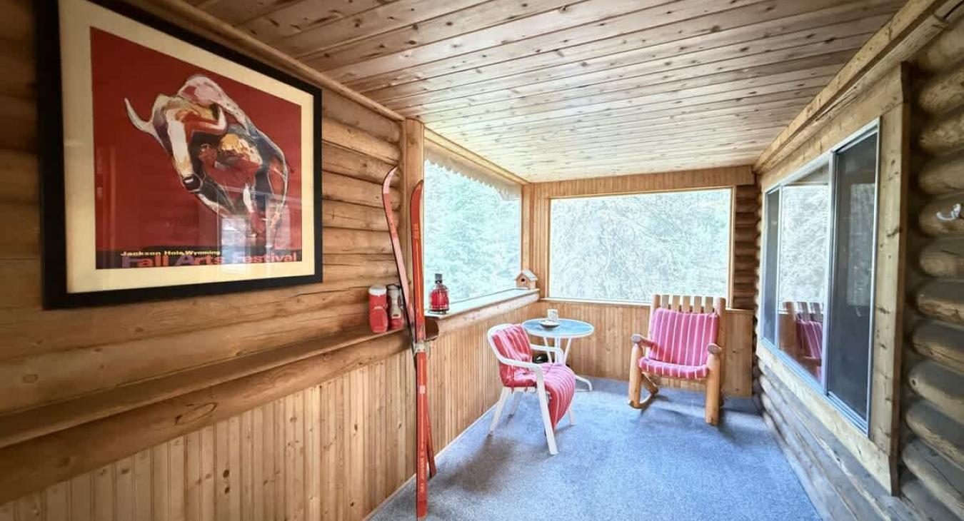 Beautiful large screened porch to enjoy the beautiful surroundings upstairs.