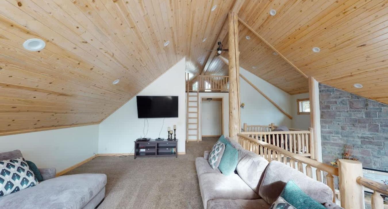 Loft is equipped with tv for entertainment.