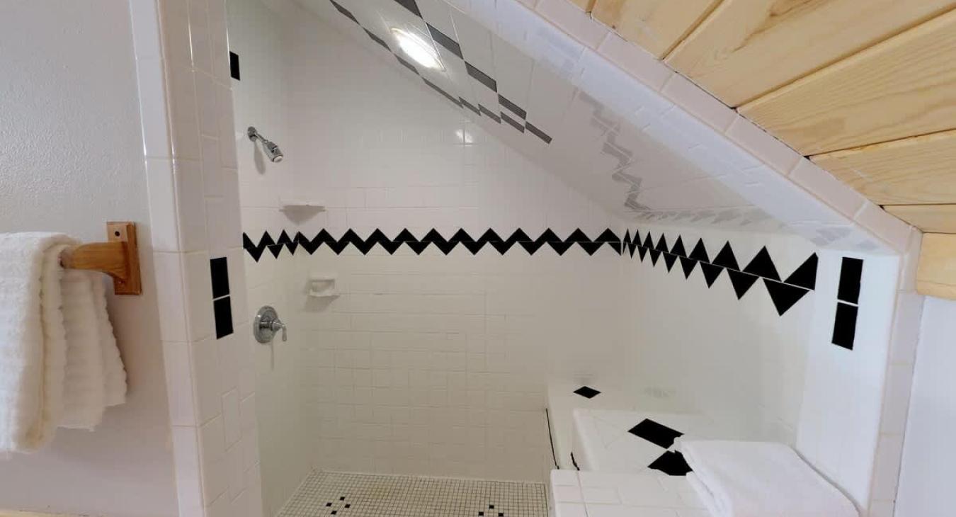 Large walk in shower in the ensuite bathroom.