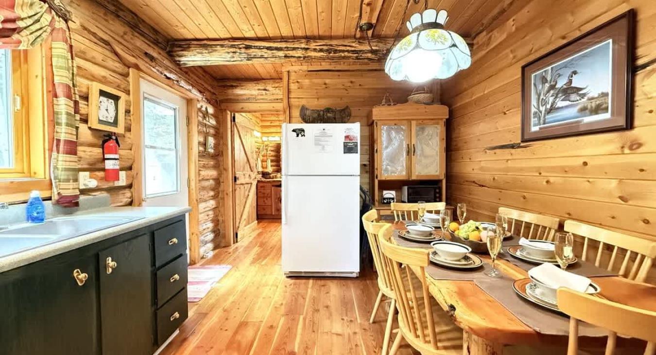 Full size kitchen with appliances, dishes, pots and pans, utensils, and basic cooking essentials.