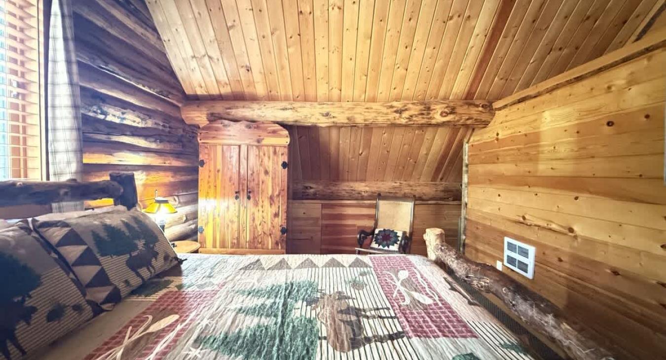 Bedroom #3 located upstairs with a Full and Twin bed.