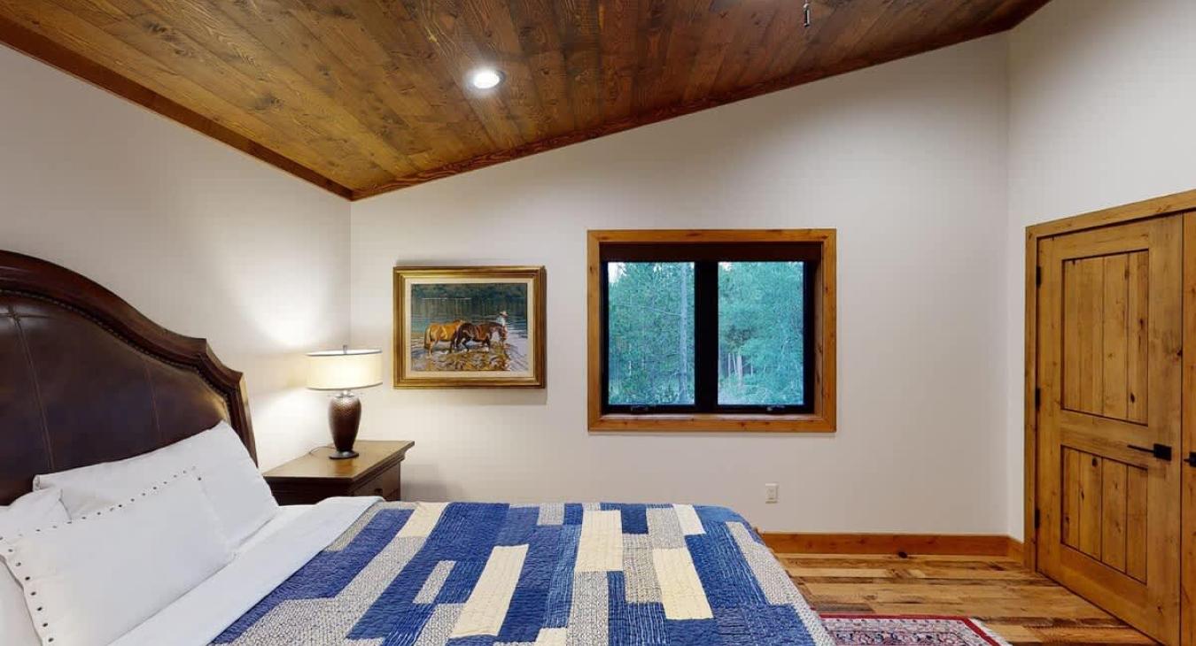 View of the window from the second bedroom bedside.