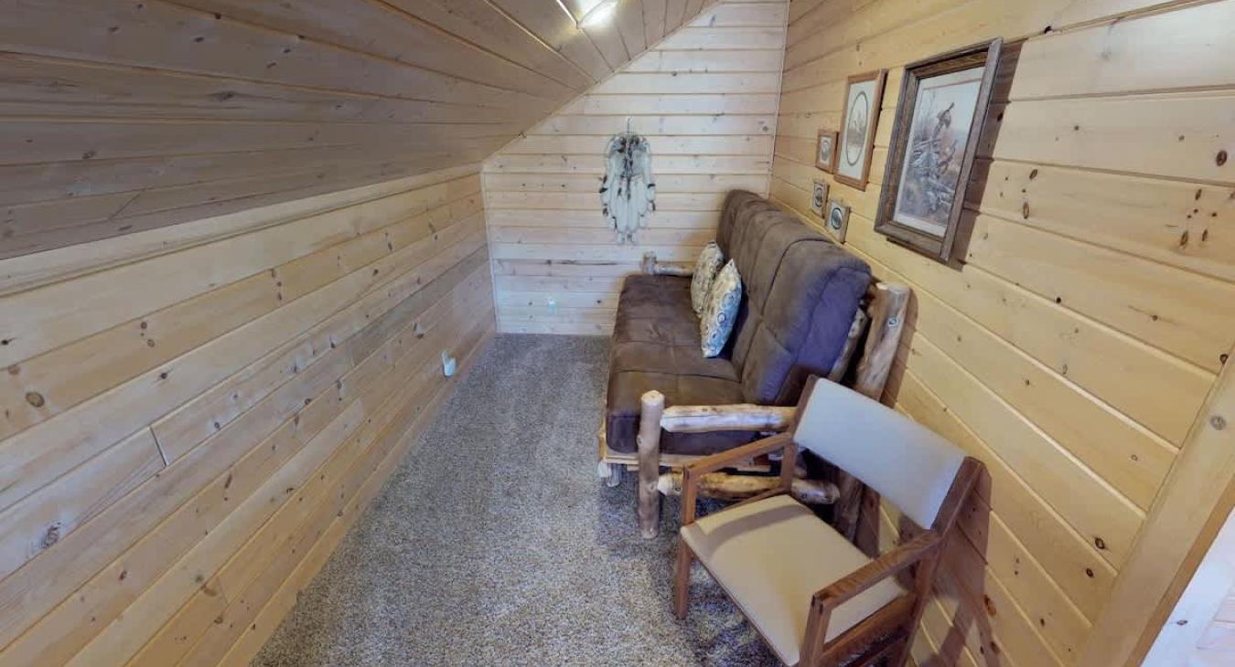 Upstairs loft corner with futon bed.