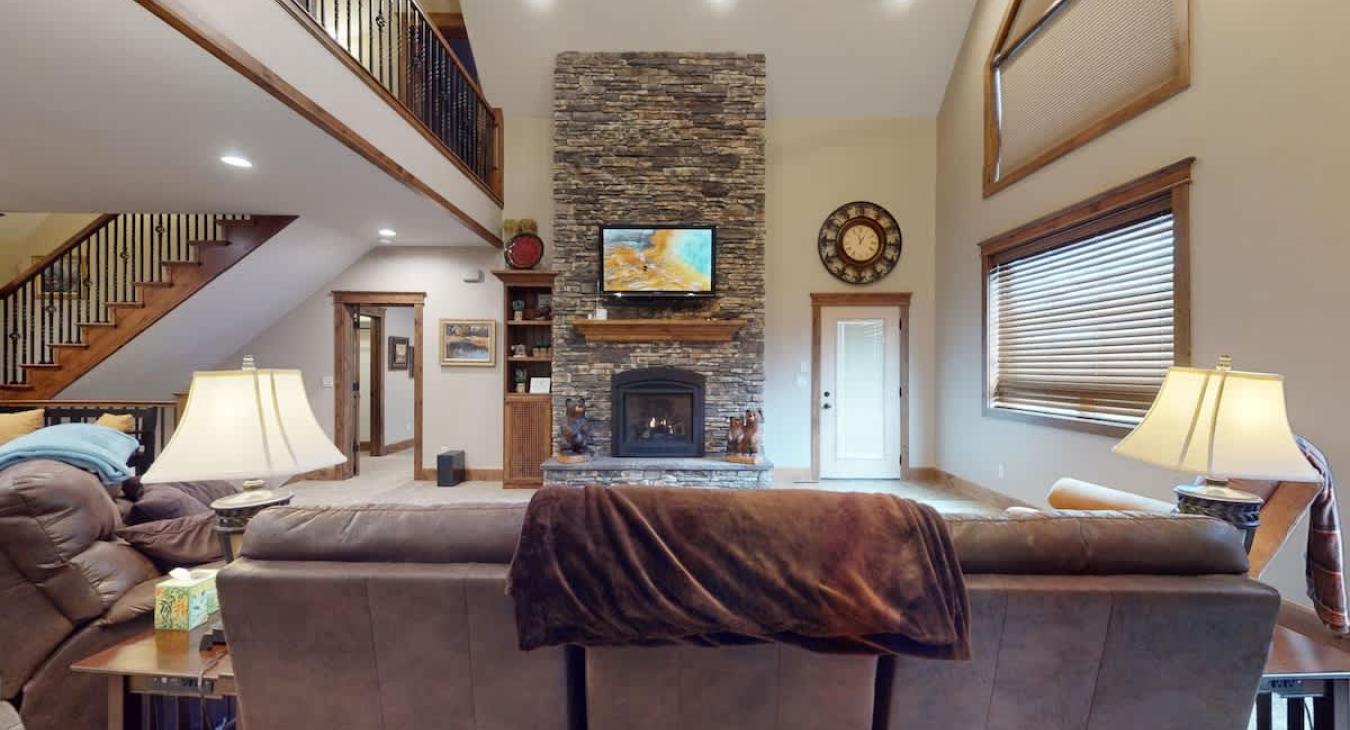 Large windows illuminate the area making it feel like the perfect cozy space.