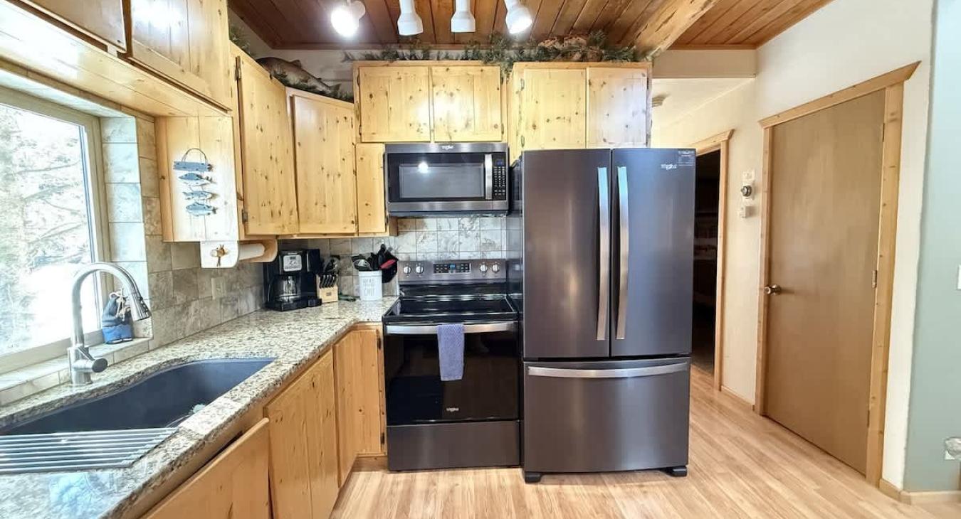 The kitchen lets in lots of natural light.