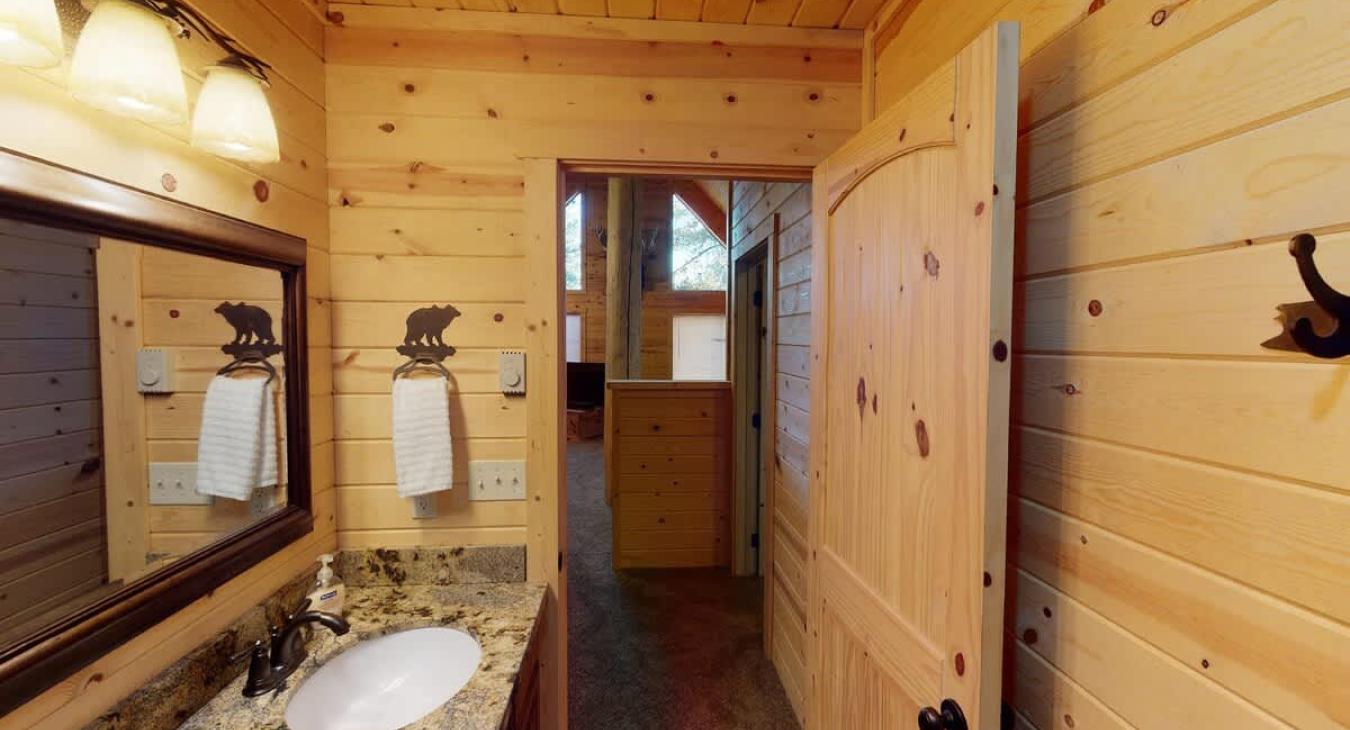 This bathroom is shared between the second and third bedroom.