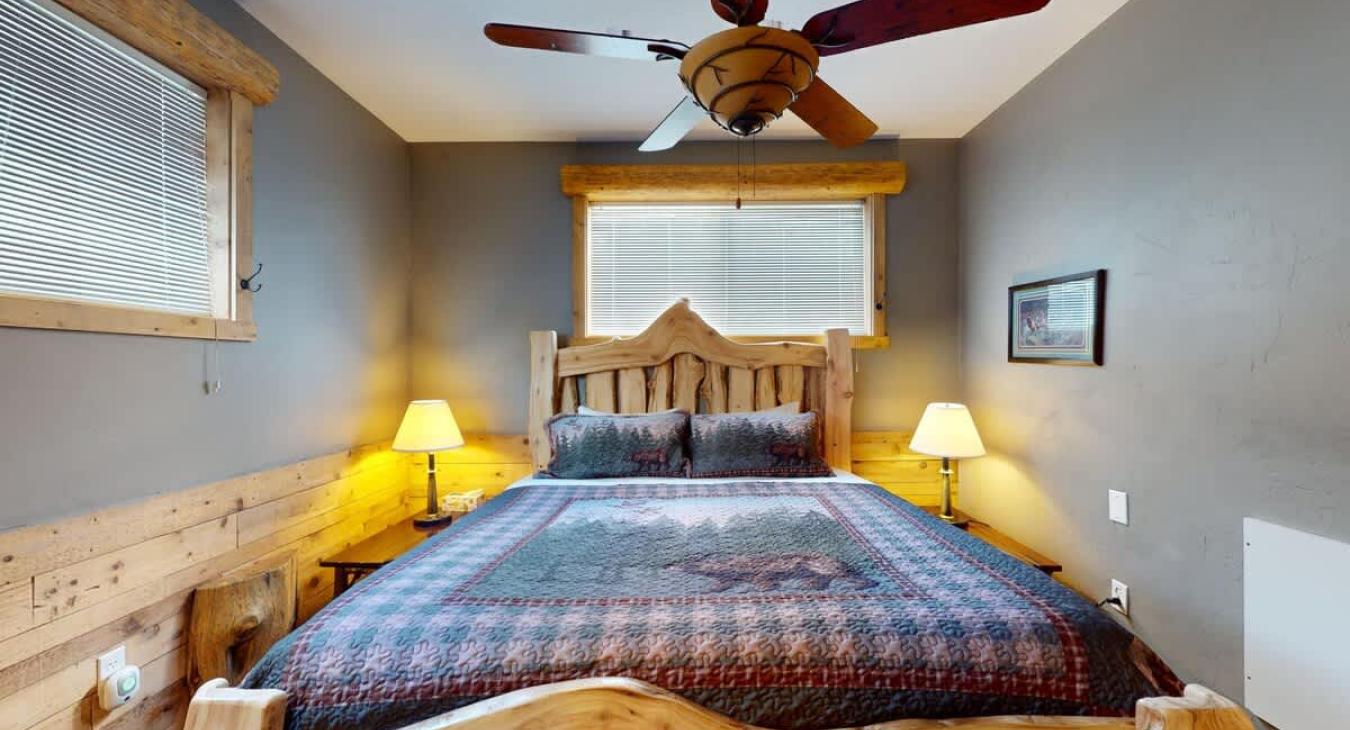 Bedroom #4 located upstairs with a King size bed.