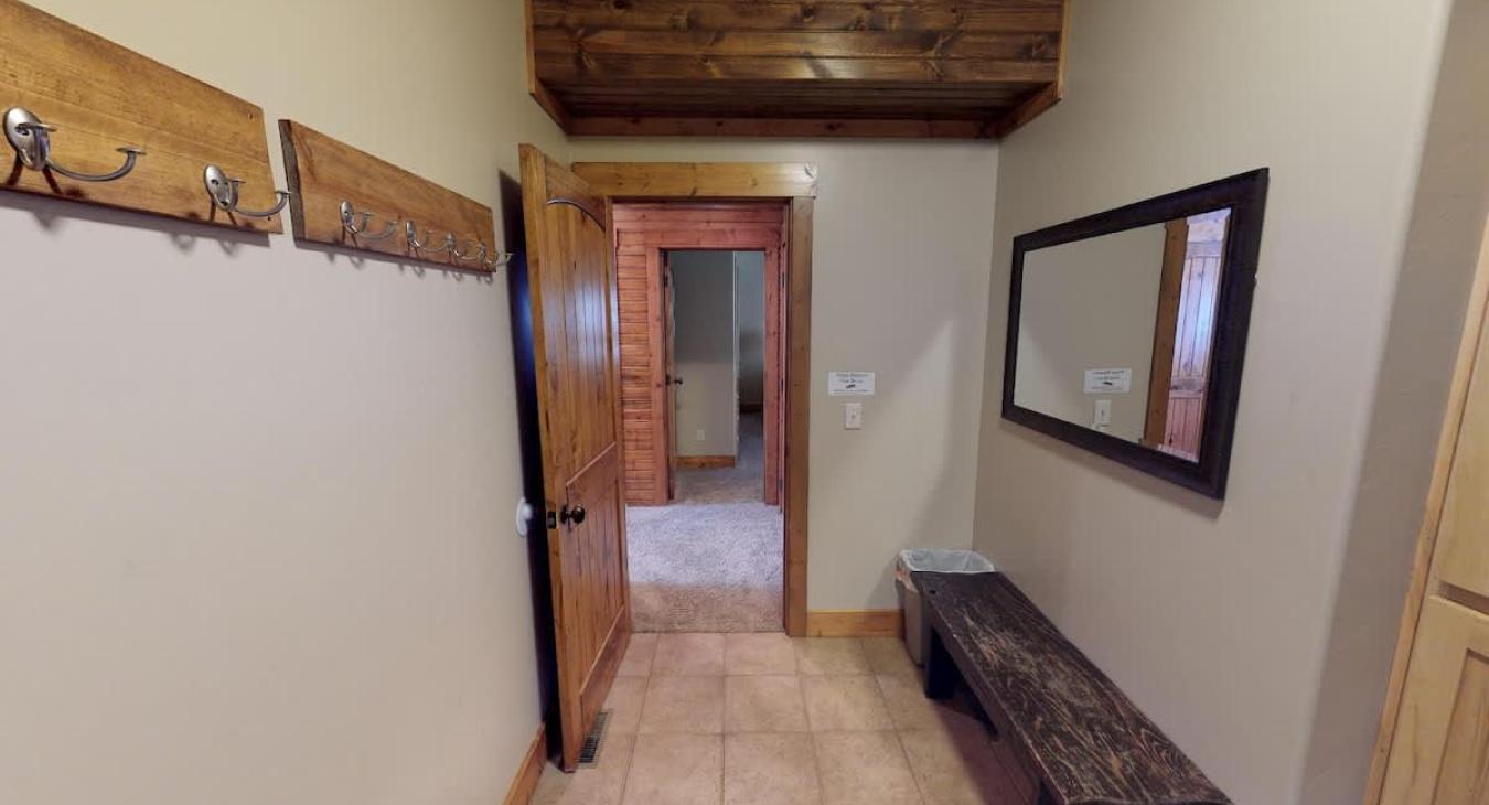 A mudroom is located within the cabin to store shoes and coats.