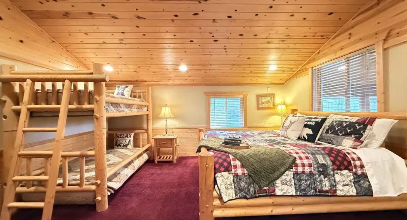 King bed and Twin bunk bed in the master bedroom.