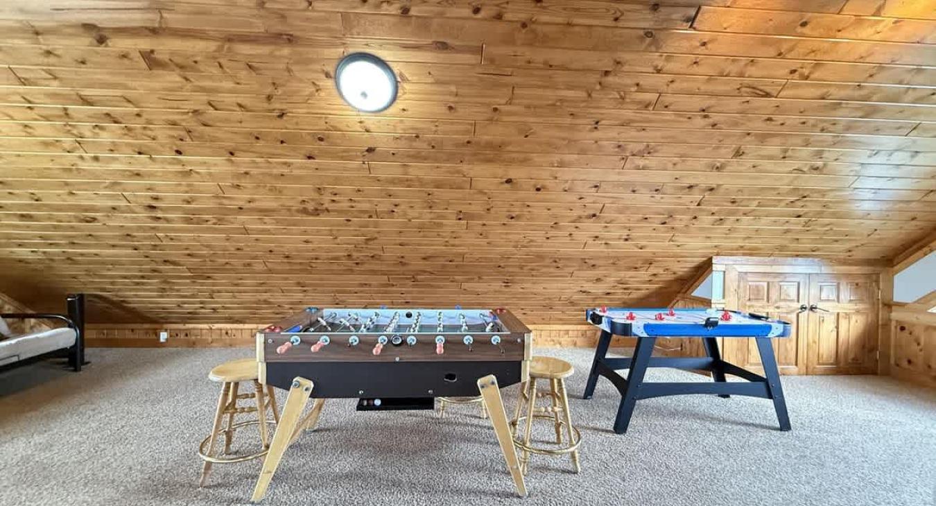 Foosball and air hockey tables for some fun games.