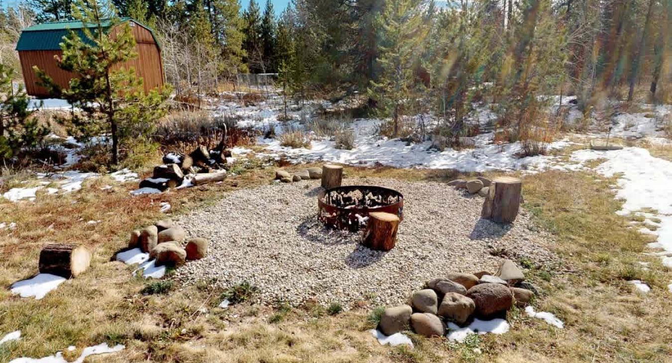 Firepit located outside, just make sure to bring your own wood.