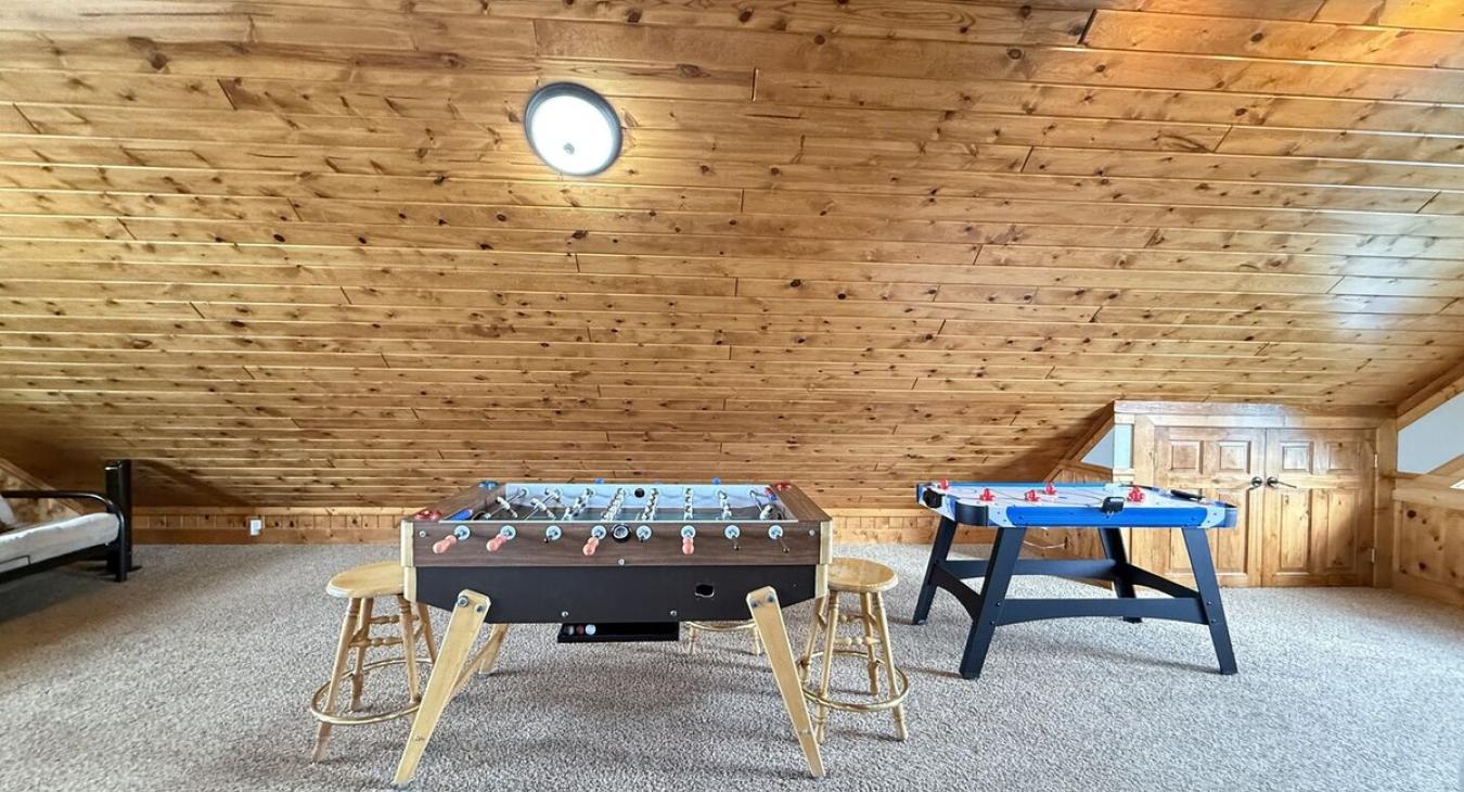 Foosball and air hockey tables for some fun games.