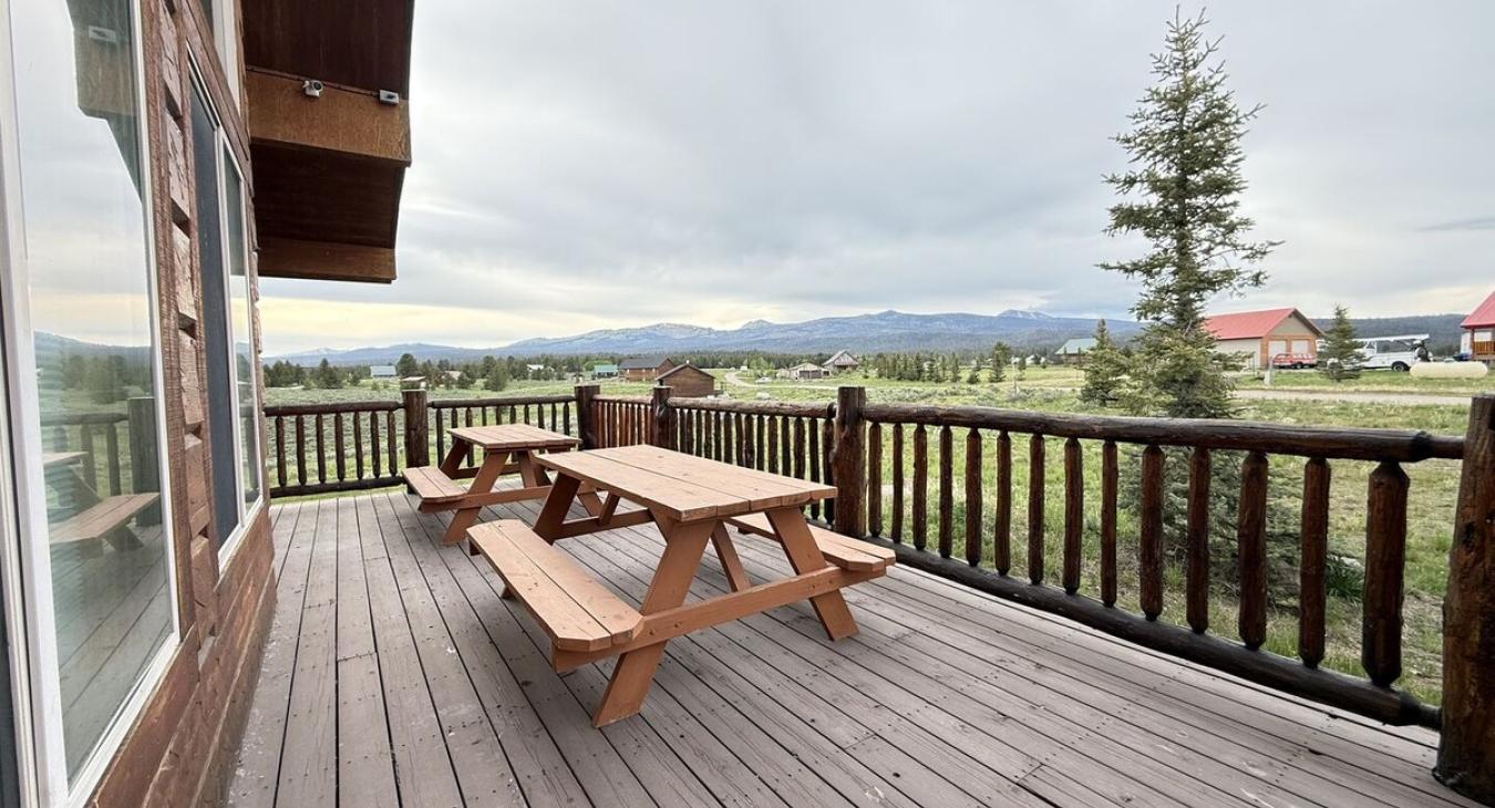 Seating outside on the deck to enjoy the view.