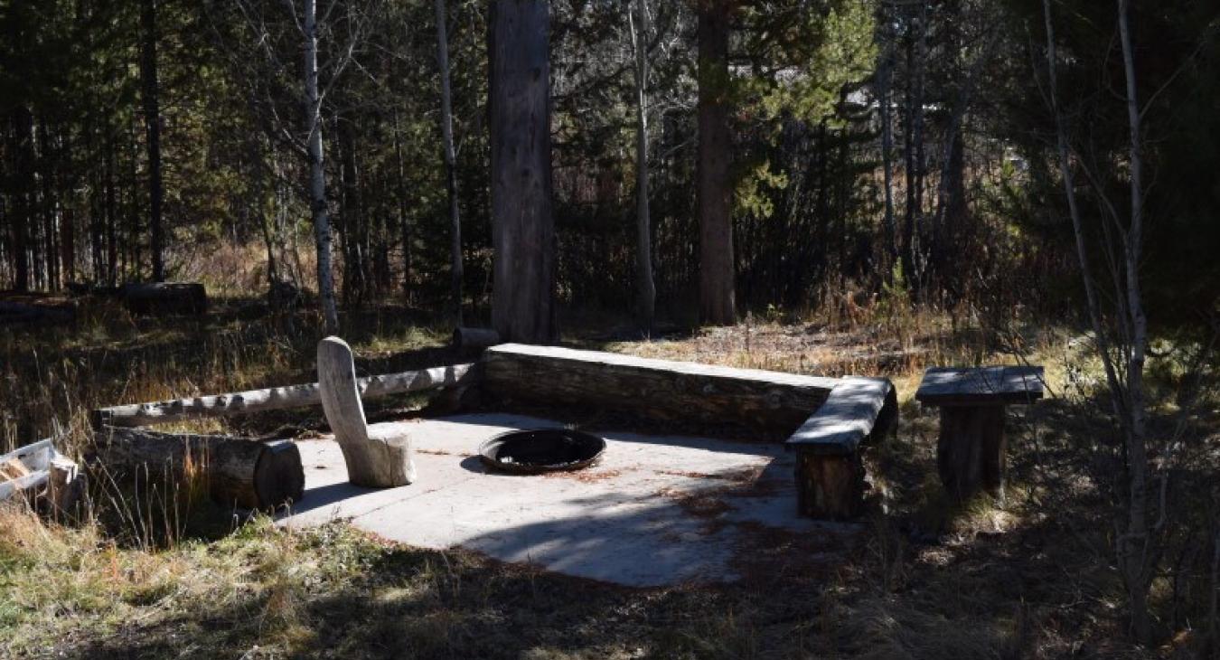 Fire pit located outside for your use.