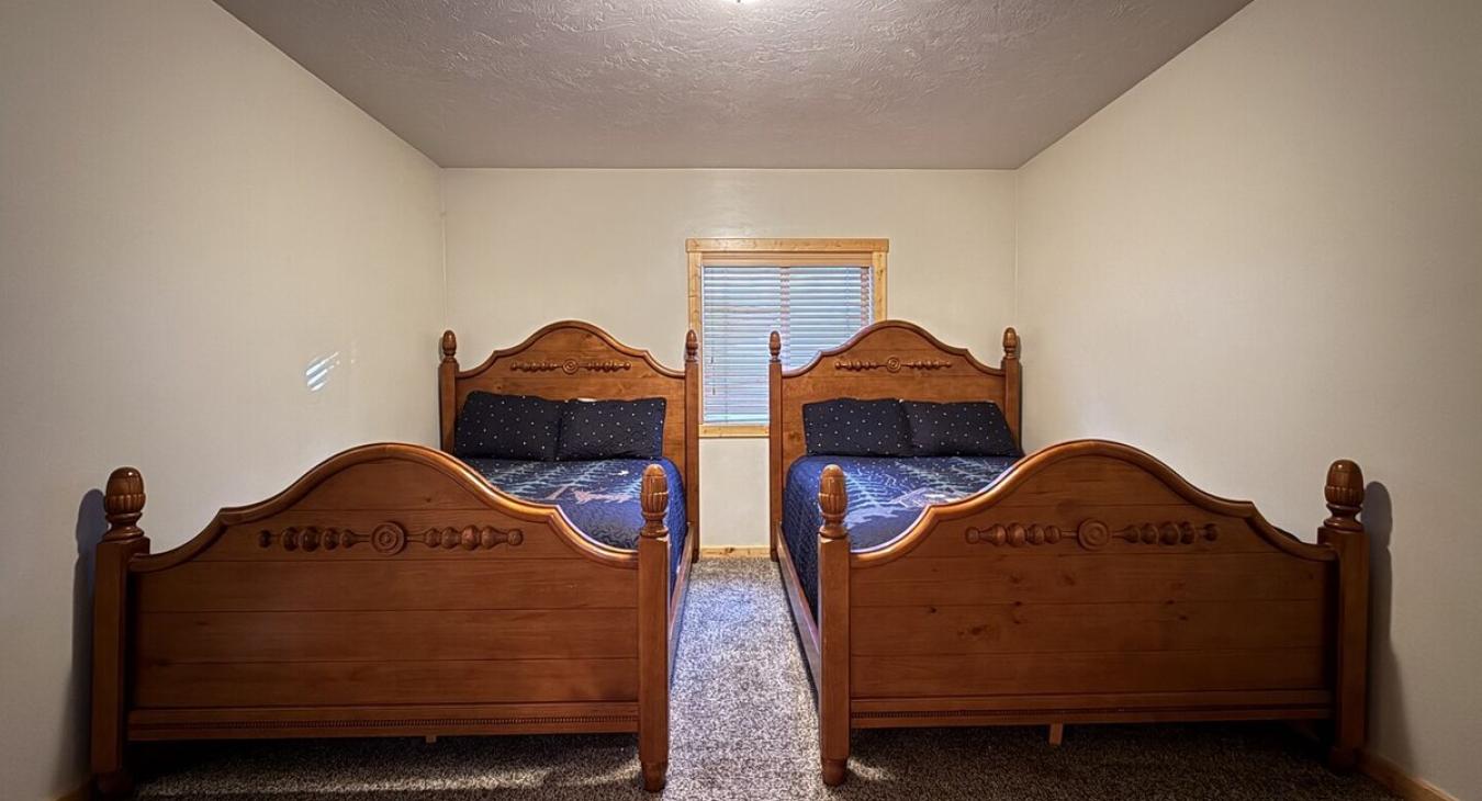 Natural light beams into the room from the window during the day.