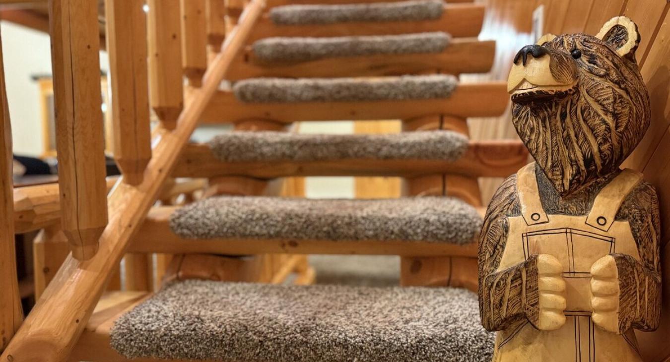 The stairs in a cabin are a whole vibe on their own. They’re not just functional; they’re often a statement piece that brings rustic charm and character to the space.