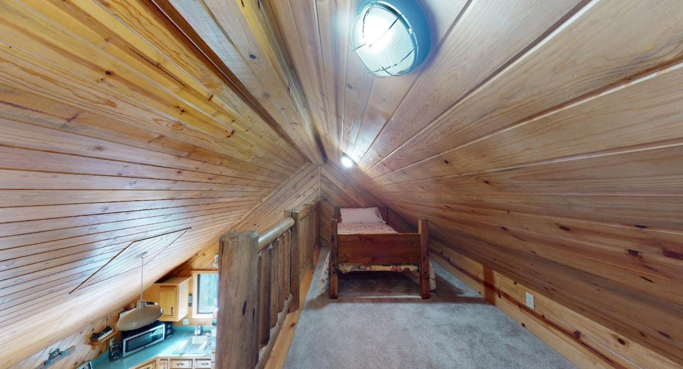 Loft area with 2 single beds.