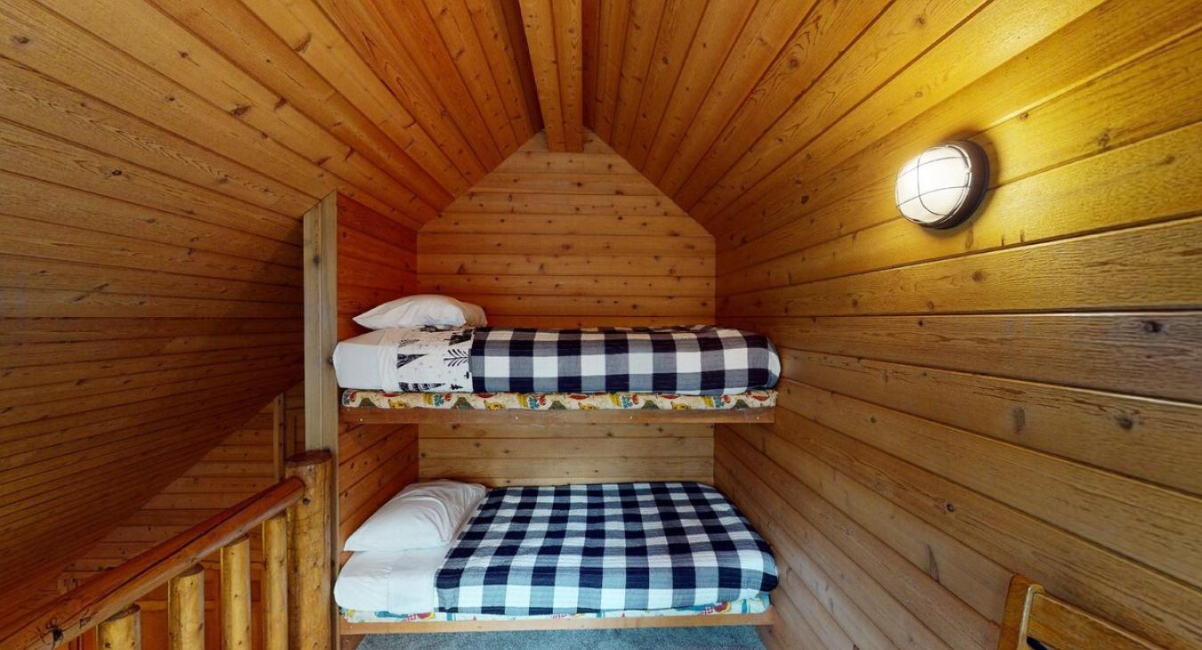 Ladder loft with twin size bunk beds.