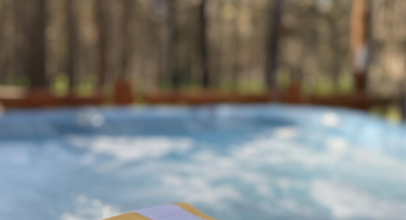 Hot tub on the deck for everyone to enjoy.